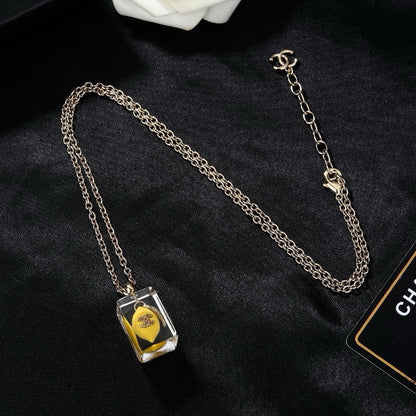 Chanel Clear Lucite Ice Cube Yellow Mini Bag Pendant Necklace