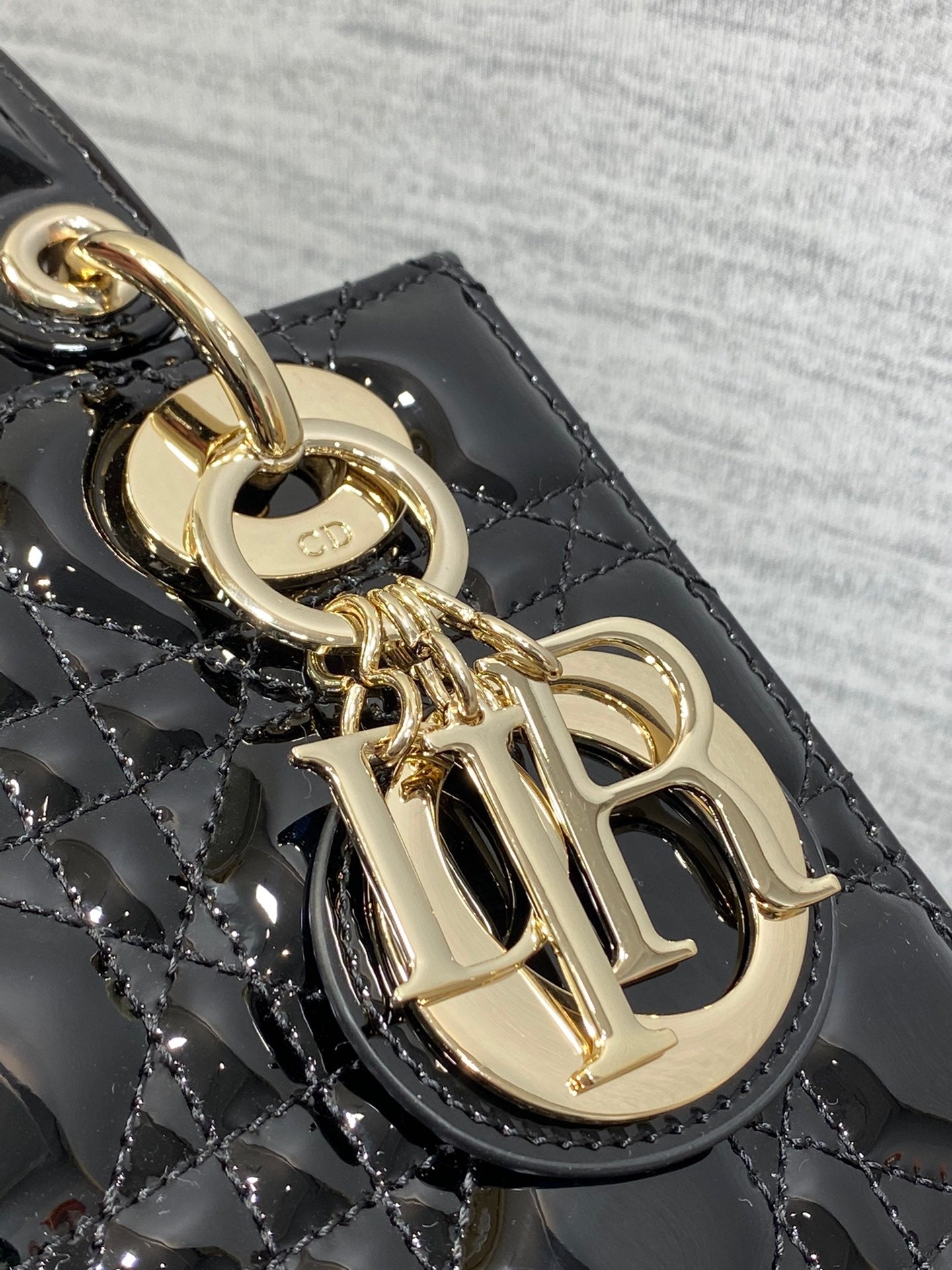 Lady Dior Four-Compartment Bag — Black Patent Leather with Light Gold Hardware