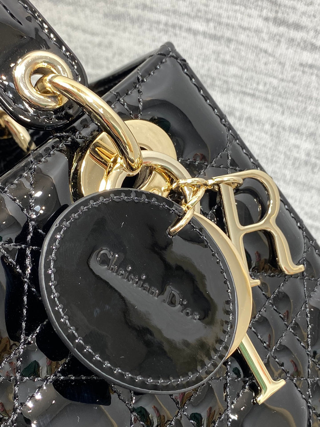 Lady Dior Four-Compartment Bag — Black Patent Leather with Light Gold Hardware