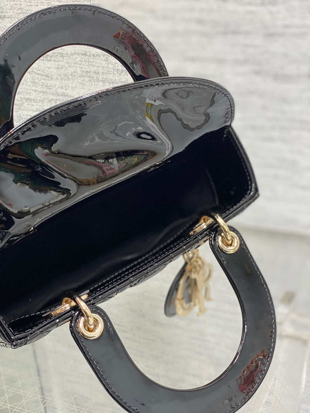Lady Dior Four-Compartment Bag — Black Patent Leather with Light Gold Hardware