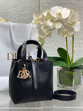 Toujours Vertical Small Bag — Black