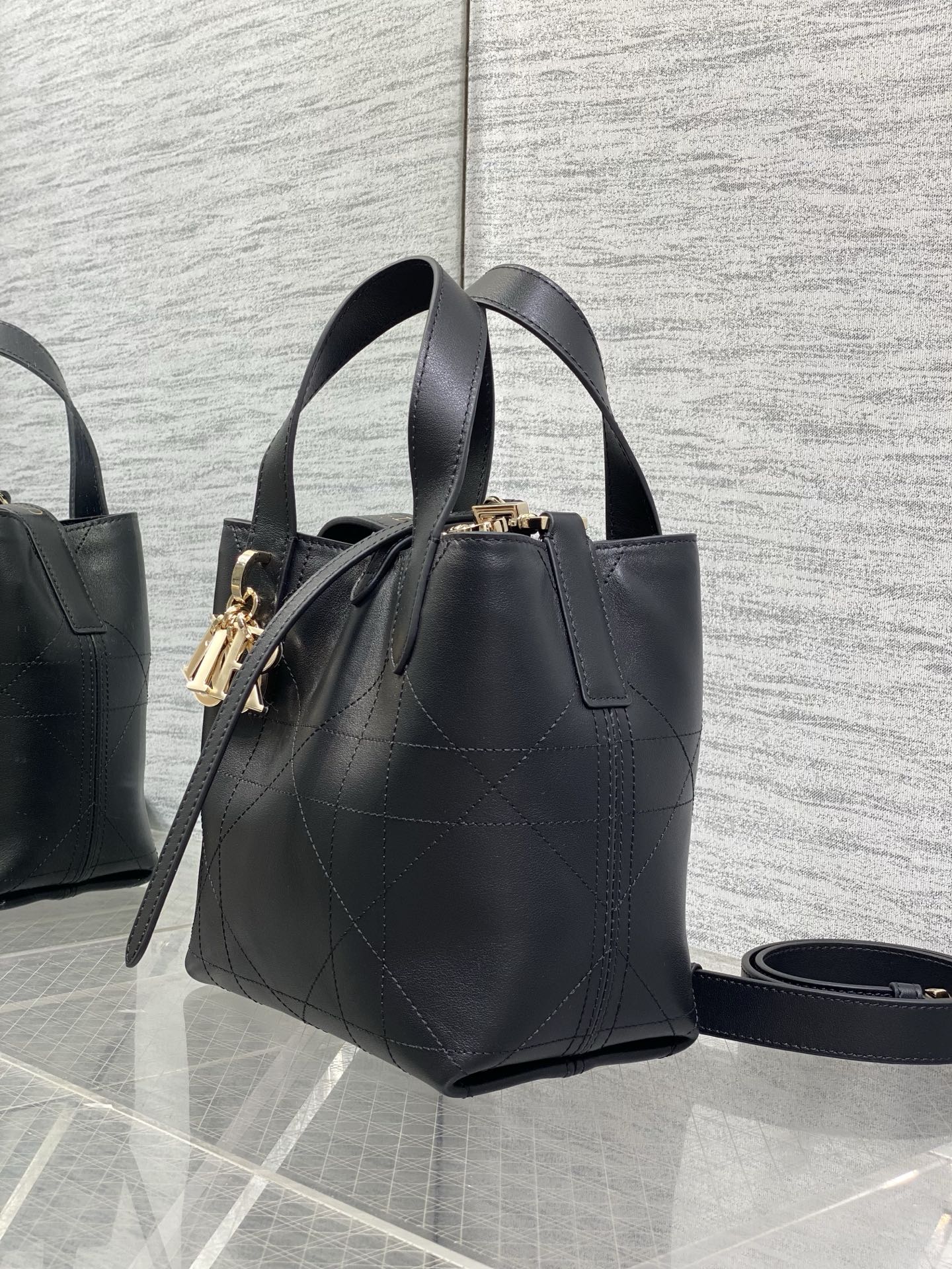 Toujours Vertical Small Bag — Black