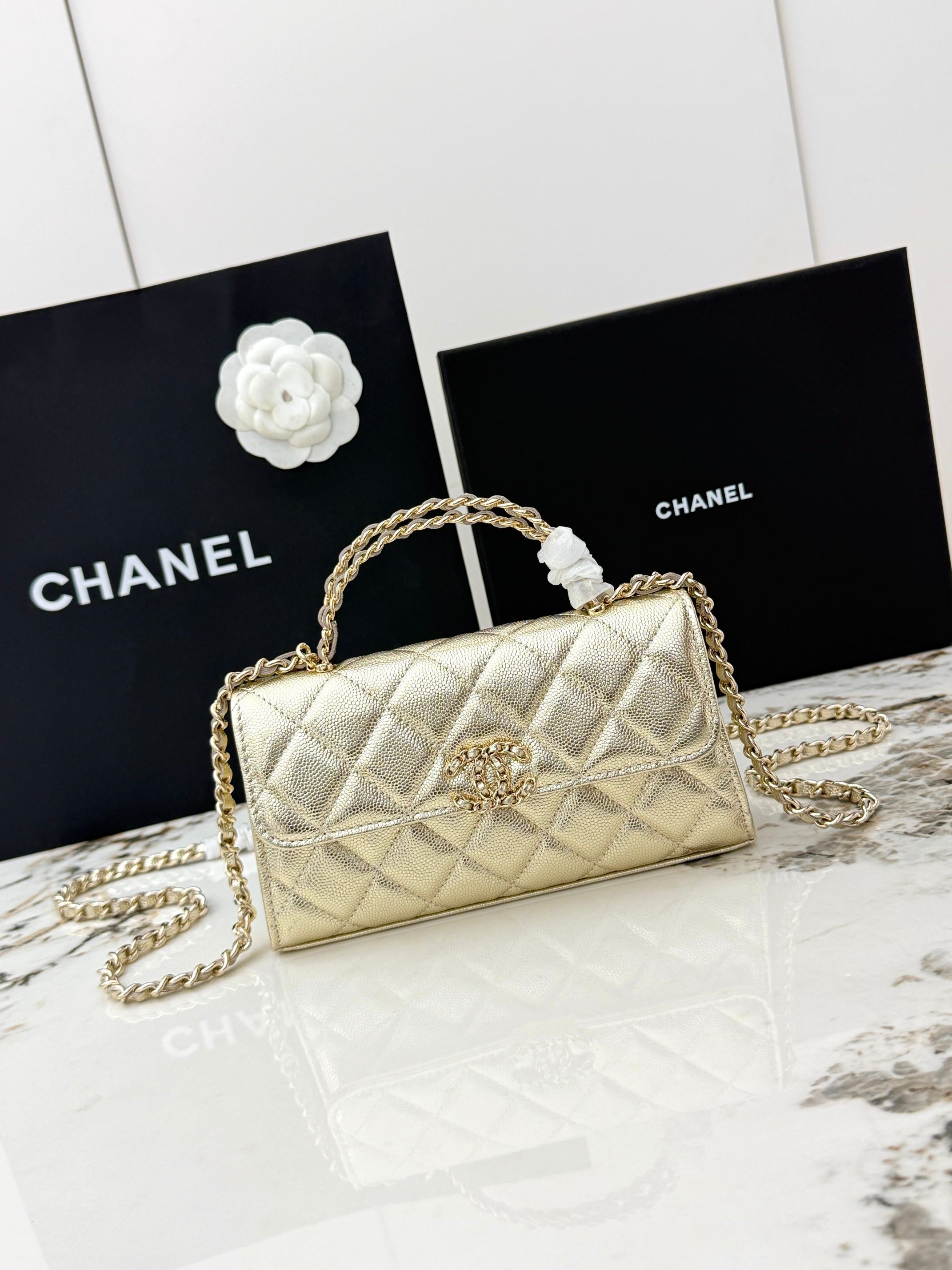 Chanel 25S Caviar Leather Kelly Handle Bag — Gold