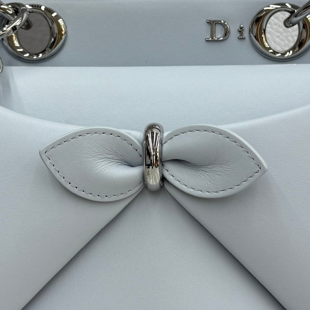 Dior 2026 Spring/Summer Bow Handbag — Ice Blue with Silver Hardware
