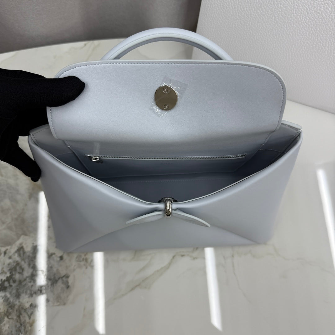Dior 2026 Spring/Summer Bow Handbag — Ice Blue with Silver Hardware