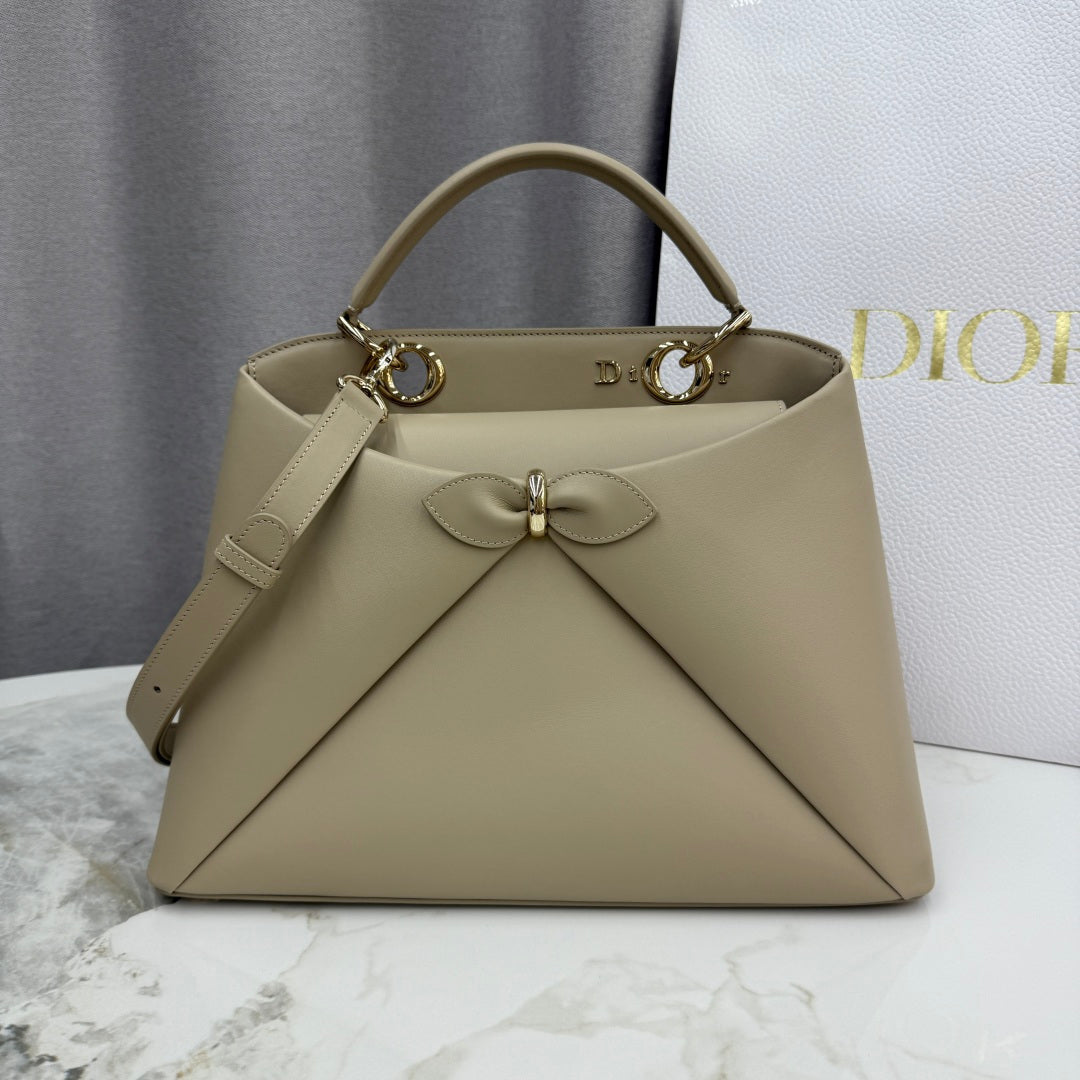 Dior 2026 Spring/Summer Bow Handbag — Apricot with Gold Hardware