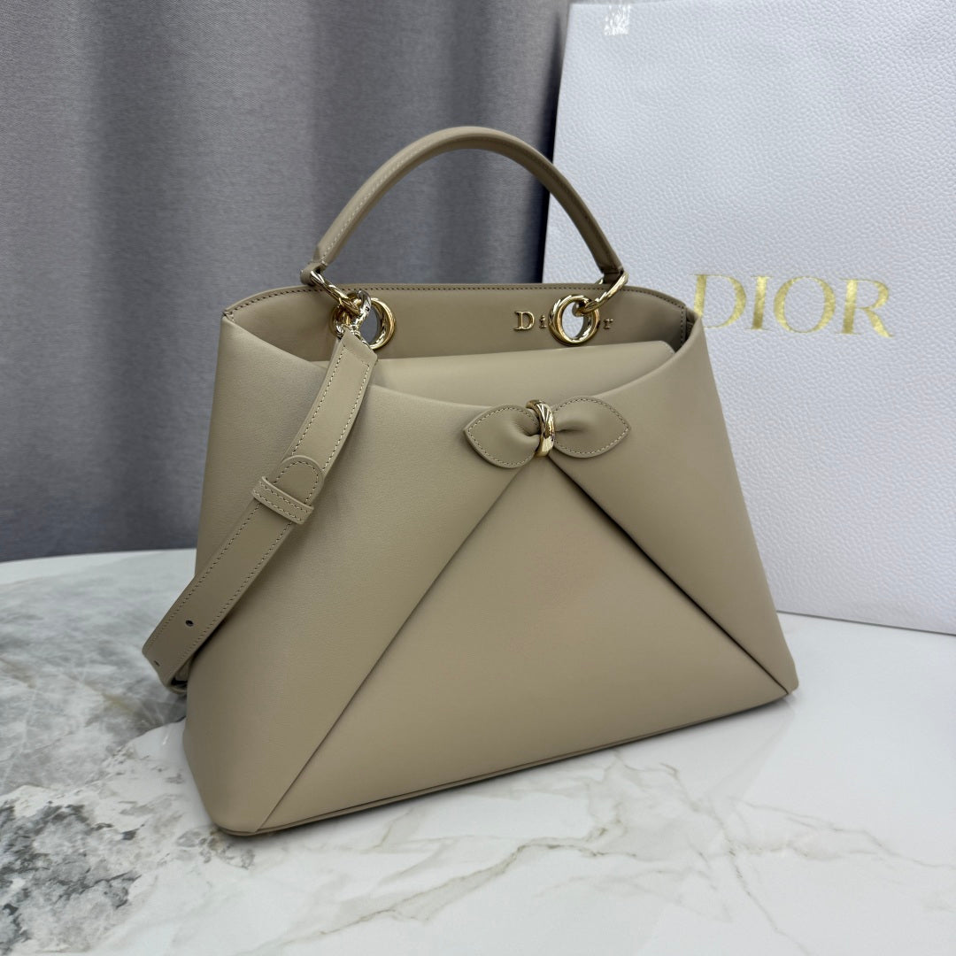 Dior 2026 Spring/Summer Bow Handbag — Apricot with Gold Hardware