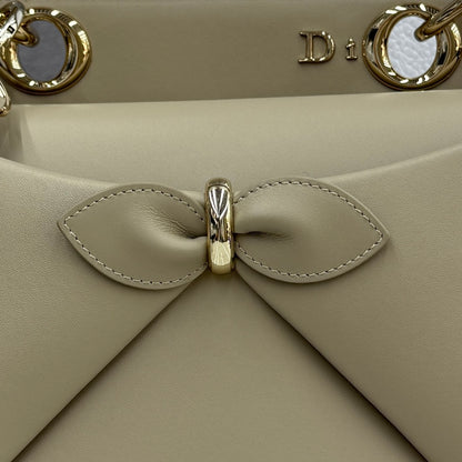 Dior 2026 Spring/Summer Bow Handbag — Apricot with Gold Hardware