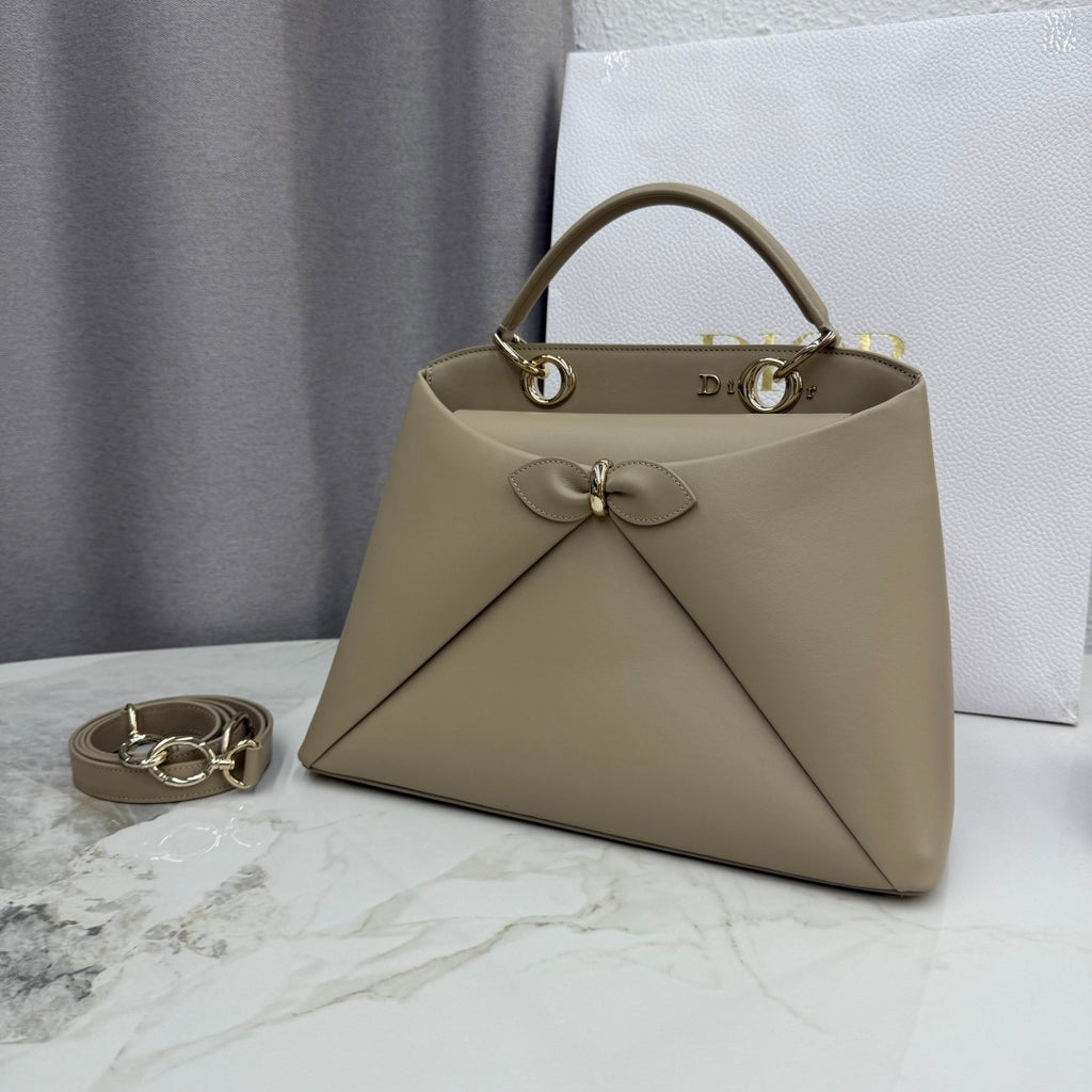 Dior 2026 Spring/Summer Bow Handbag — Apricot with Gold Hardware