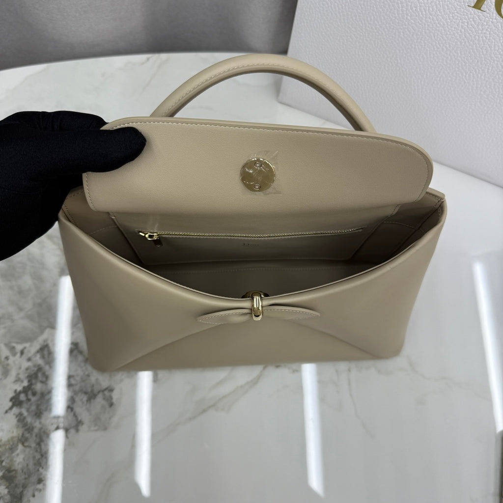 Dior 2026 Spring/Summer Bow Handbag — Apricot with Gold Hardware