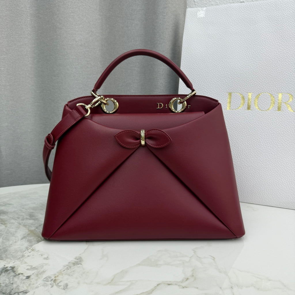 Dior 2026 Spring/Summer Bow Handbag — Burgundy with Gold Hardware