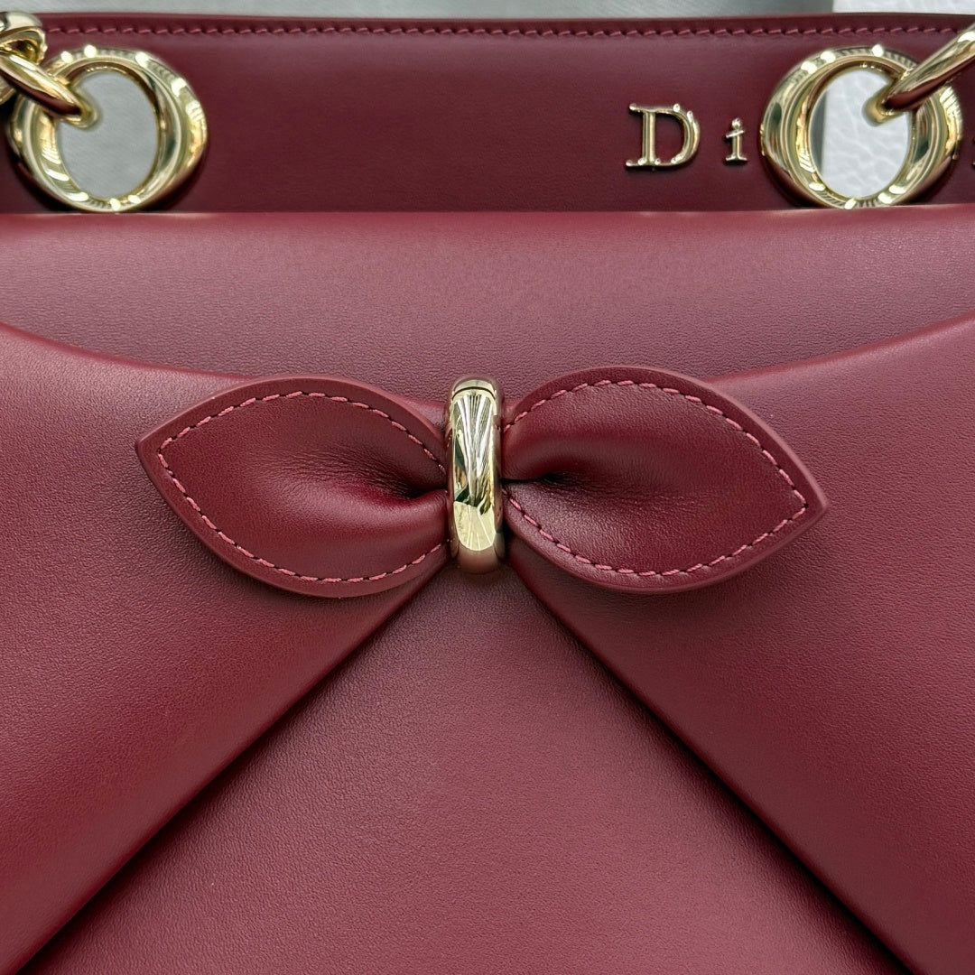 Dior 2026 Spring/Summer Bow Handbag — Burgundy with Gold Hardware