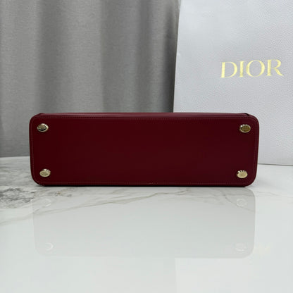 Dior 2026 Spring/Summer Bow Handbag — Burgundy with Gold Hardware