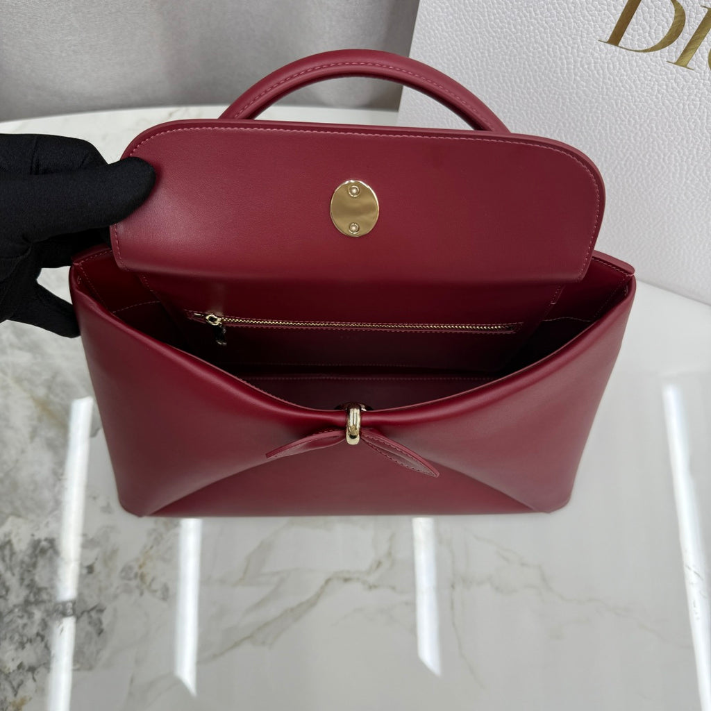 Dior 2026 Spring/Summer Bow Handbag — Burgundy with Gold Hardware