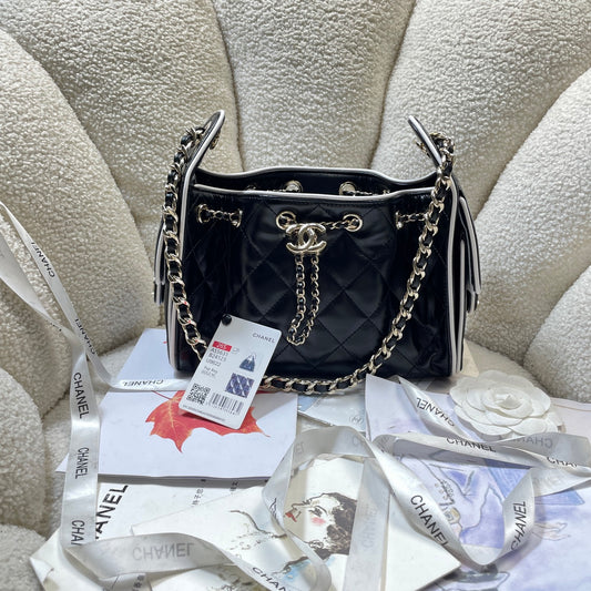 Chanel 25C Cruise Quilted Lambskin Drawstring Mini Bucket Bag Black & Silver