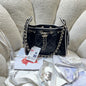 Chanel 25C Cruise Quilted Lambskin Drawstring Mini Bucket Bag Black & Silver
