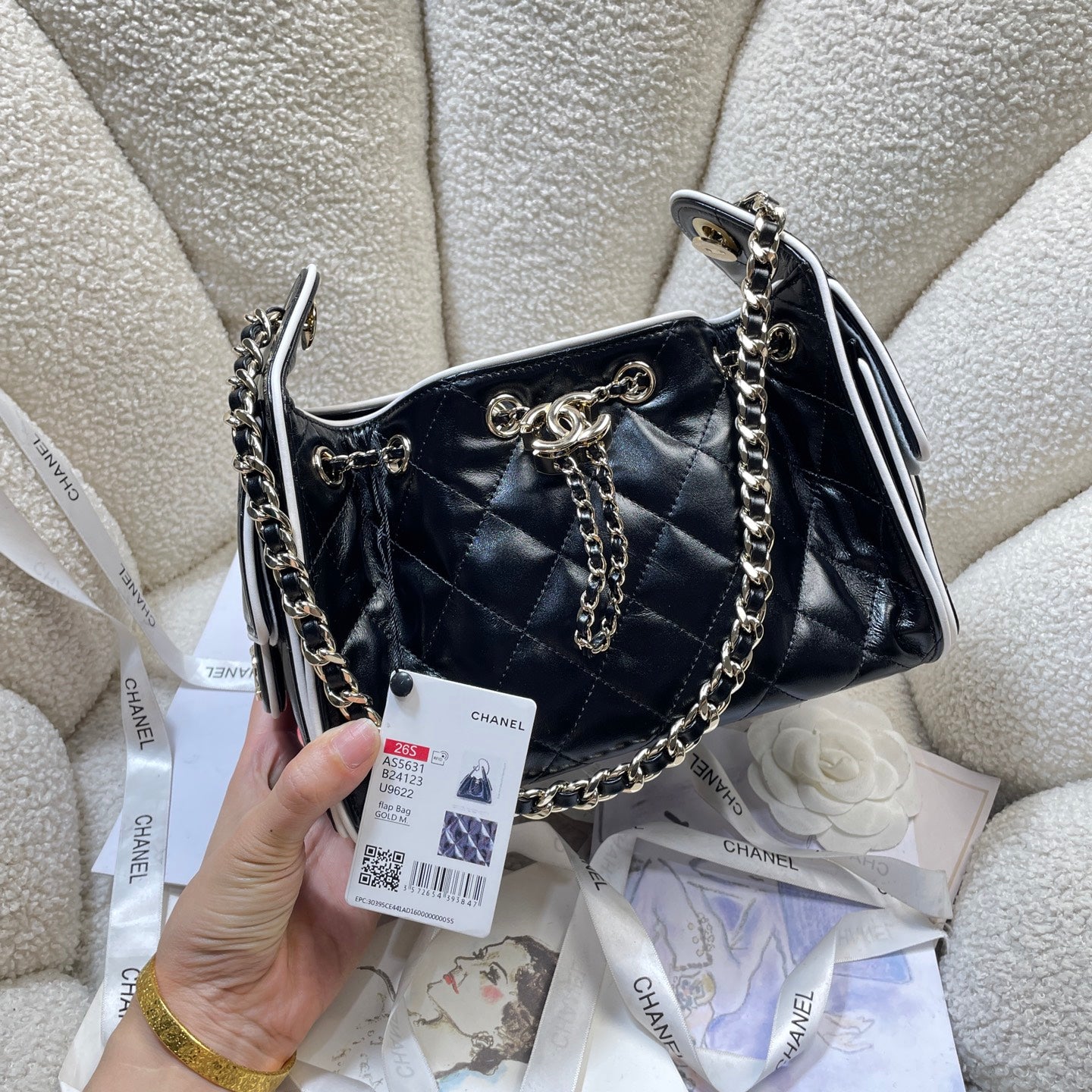 Chanel 25C Cruise Quilted Lambskin Drawstring Mini Bucket Bag Black & Silver