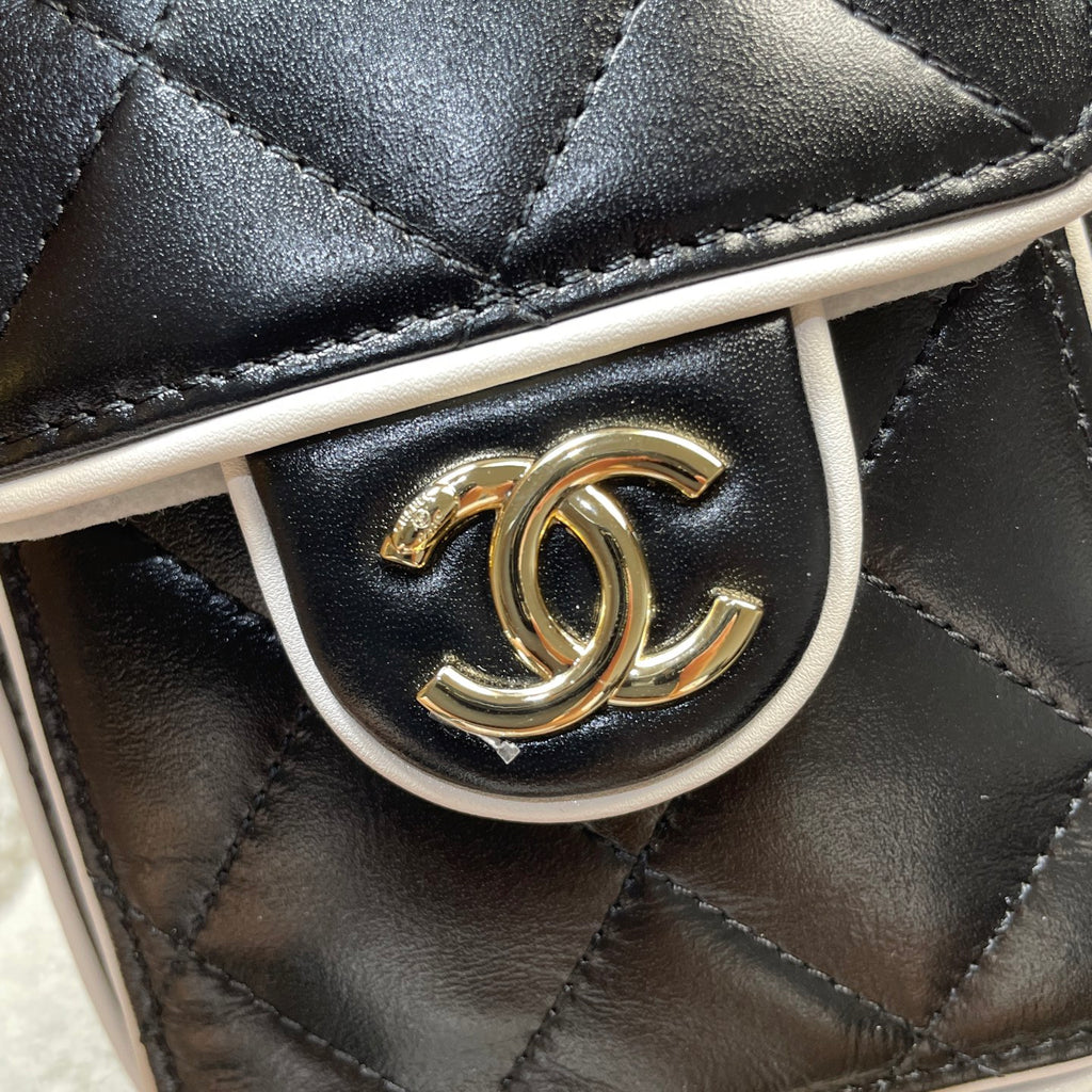 Chanel 25C Cruise Quilted Lambskin Drawstring Mini Bucket Bag Black & Silver