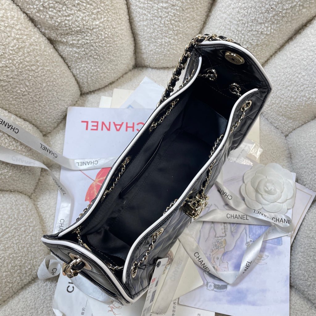 Chanel 25C Cruise Quilted Lambskin Drawstring Mini Bucket Bag Black & Silver