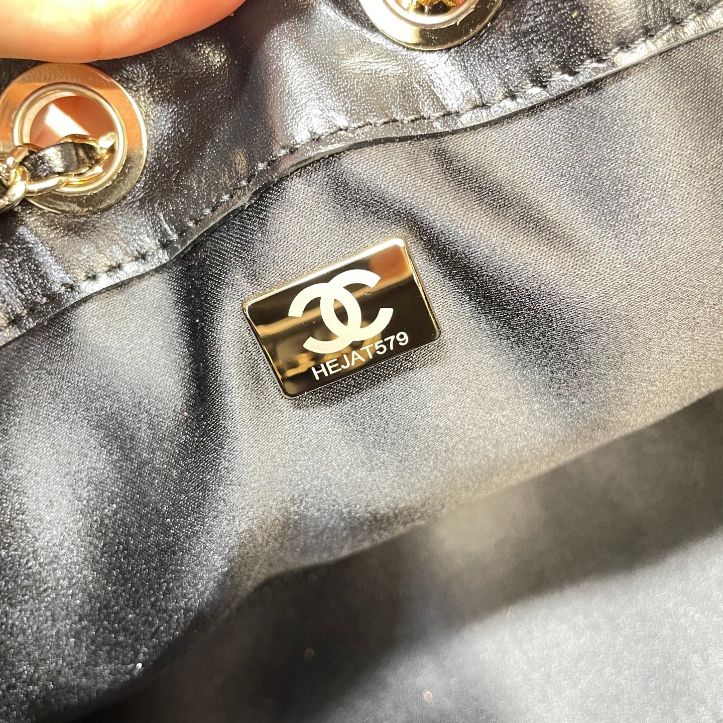 Chanel 25C Cruise Quilted Lambskin Drawstring Mini Bucket Bag Black & Silver