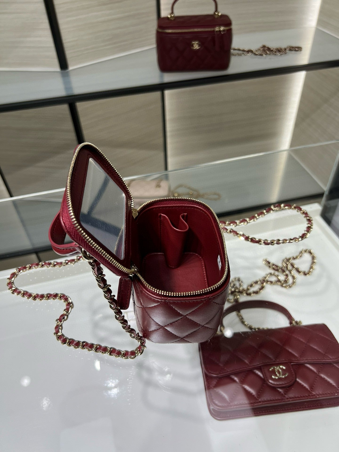 Chanel 25S Ultra Mini Vanity Case Bordeaux Red Quilted Calfskin with Chain Handle AP2198