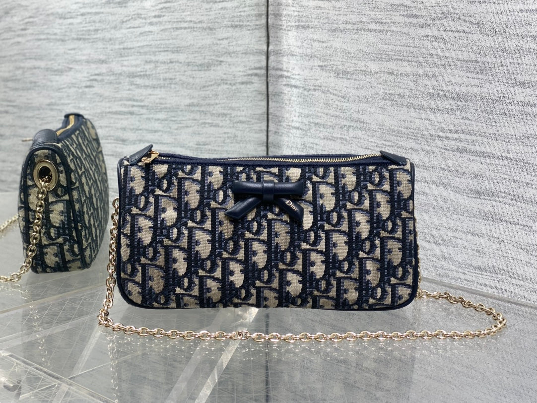 Dior Oblique Bow Chain Bag — Navy Oblique Jacquard Canvas with Black Leather Bow and Gold Hardware