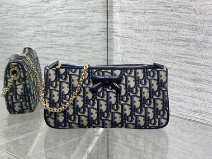 Dior Oblique Bow Chain Bag — Navy Oblique Jacquard Canvas with Black Leather Bow and Gold Hardware