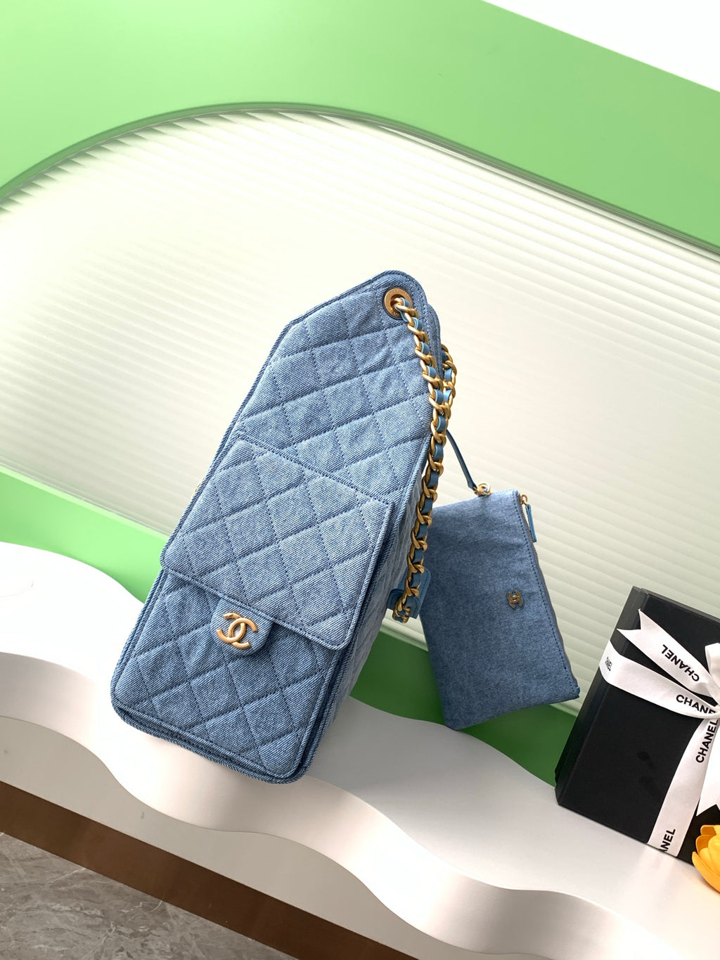 Chanel 25P Quilted Denim Drawstring Bucket Bag — Light Blue