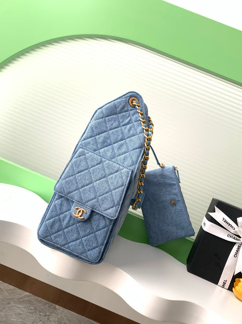 Chanel 25P Quilted Denim Drawstring Bucket Bag — Light Blue