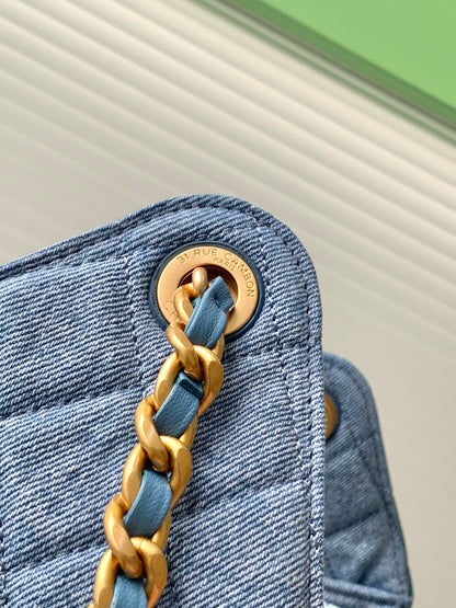 Chanel 25P Quilted Denim Drawstring Bucket Bag — Light Blue