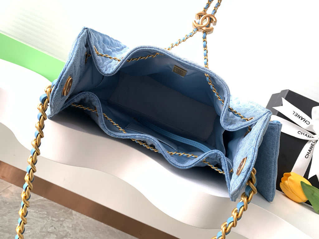 Chanel 25P Quilted Denim Drawstring Bucket Bag — Light Blue