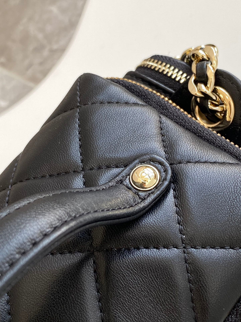 Chanel 24K Quilted Lambskin Camera Bag — Black with Silver Hardware