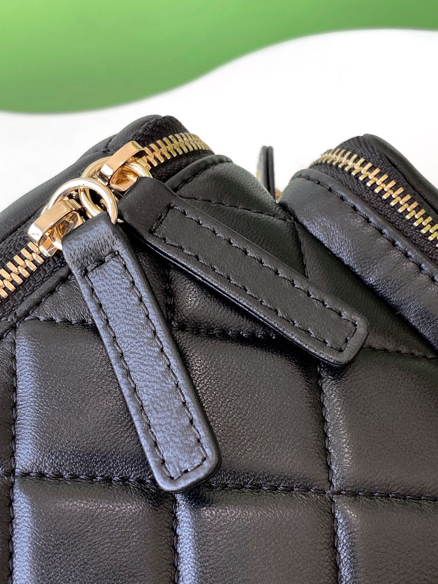 Chanel 24K Quilted Lambskin Camera Bag — Black with Silver Hardware