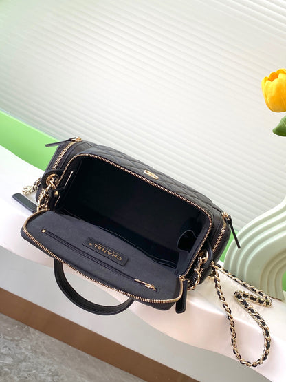 Chanel 24K Quilted Lambskin Camera Bag — Black with Silver Hardware