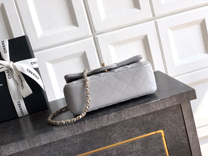 Chanel 25K Coco Handle Mini CF — Light Grey Lambskin with Crystal Bow & Gold Hardware