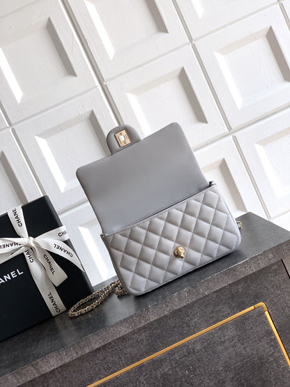Chanel 25K Coco Handle Mini CF — Light Grey Lambskin with Crystal Bow & Gold Hardware