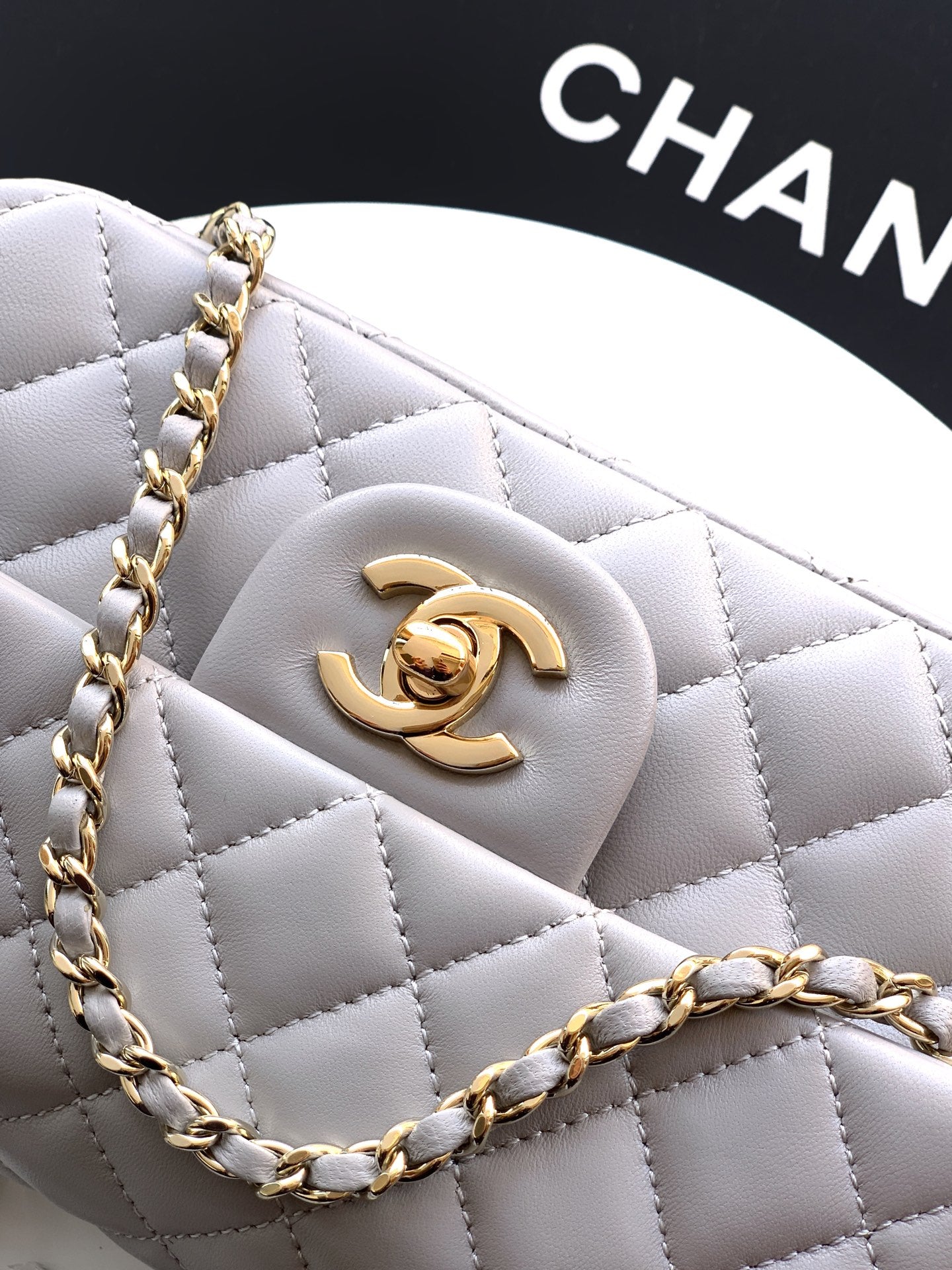 Chanel 25K Coco Handle Mini CF — Light Grey Lambskin with Crystal Bow & Gold Hardware