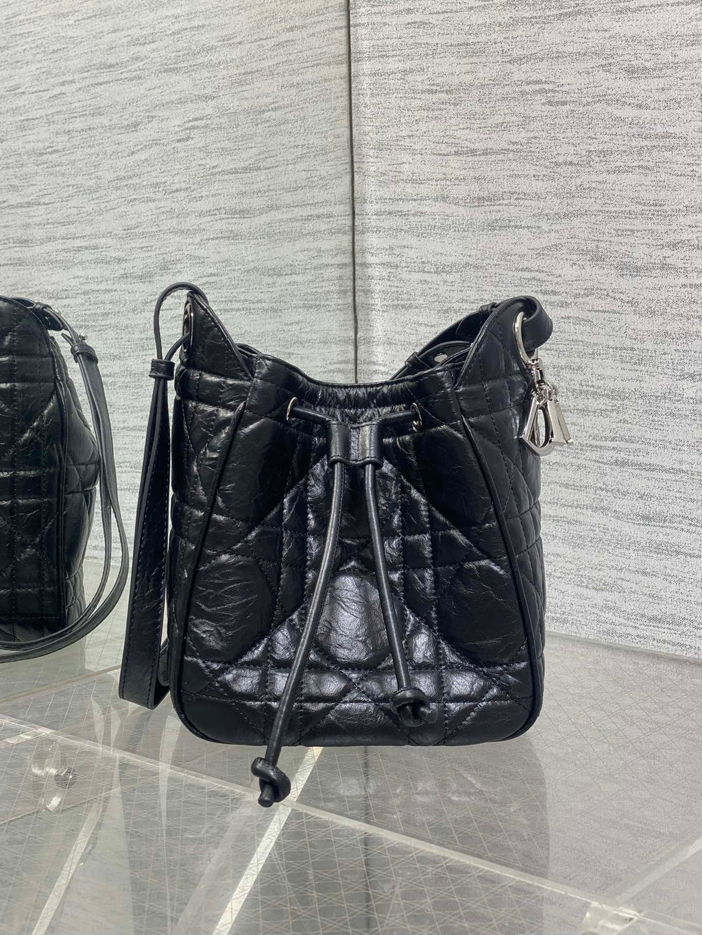 Dior Caro Motion Small Drawstring Bucket Bag Black Aged Leather Quilted Crossbody 1025