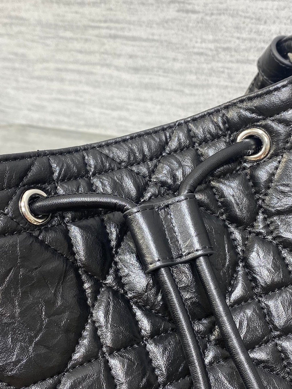 Dior Caro Motion Small Drawstring Bucket Bag Black Aged Leather Quilted Crossbody 1025