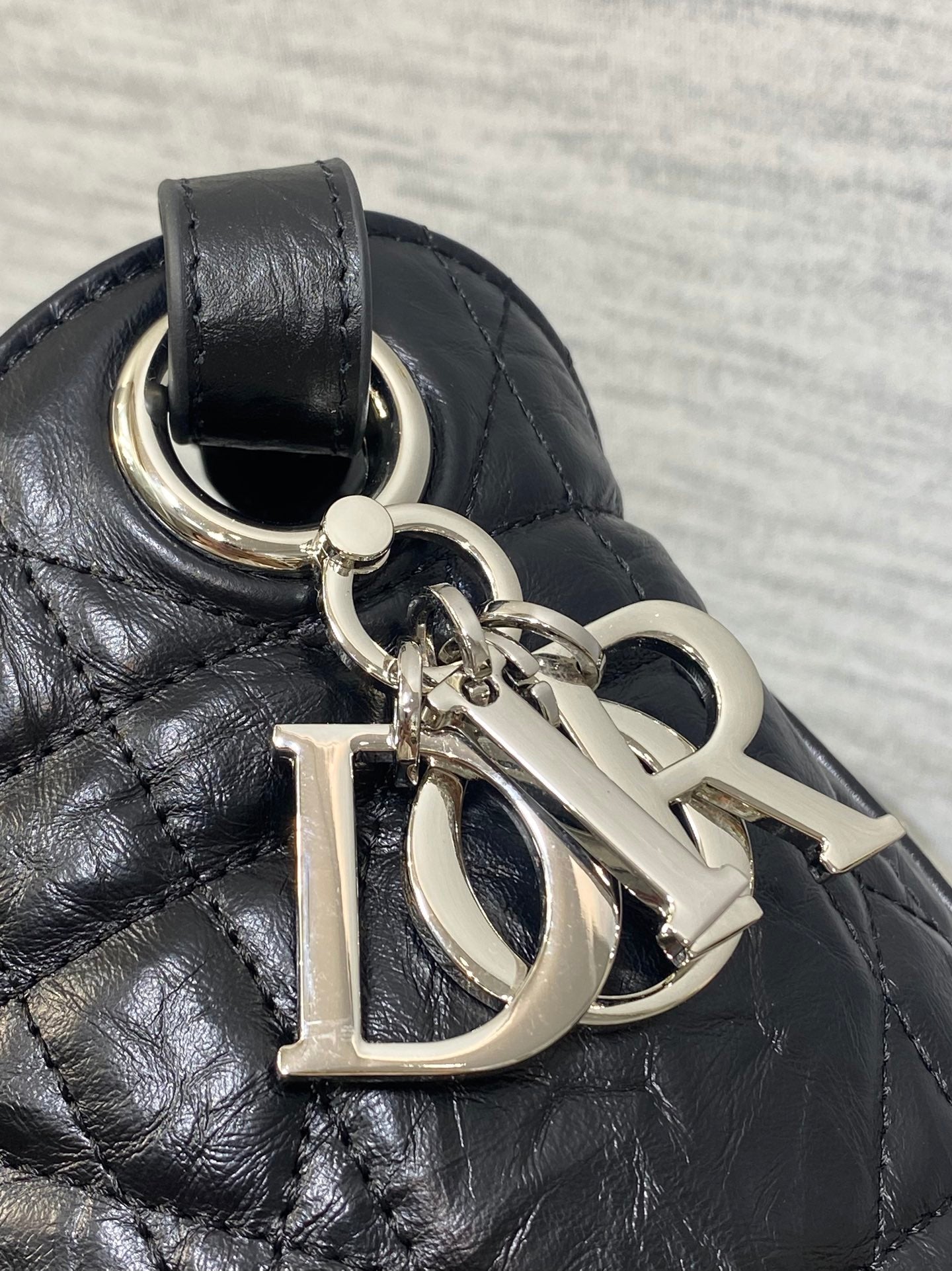 Dior Caro Motion Small Drawstring Bucket Bag Black Aged Leather Quilted Crossbody 1025