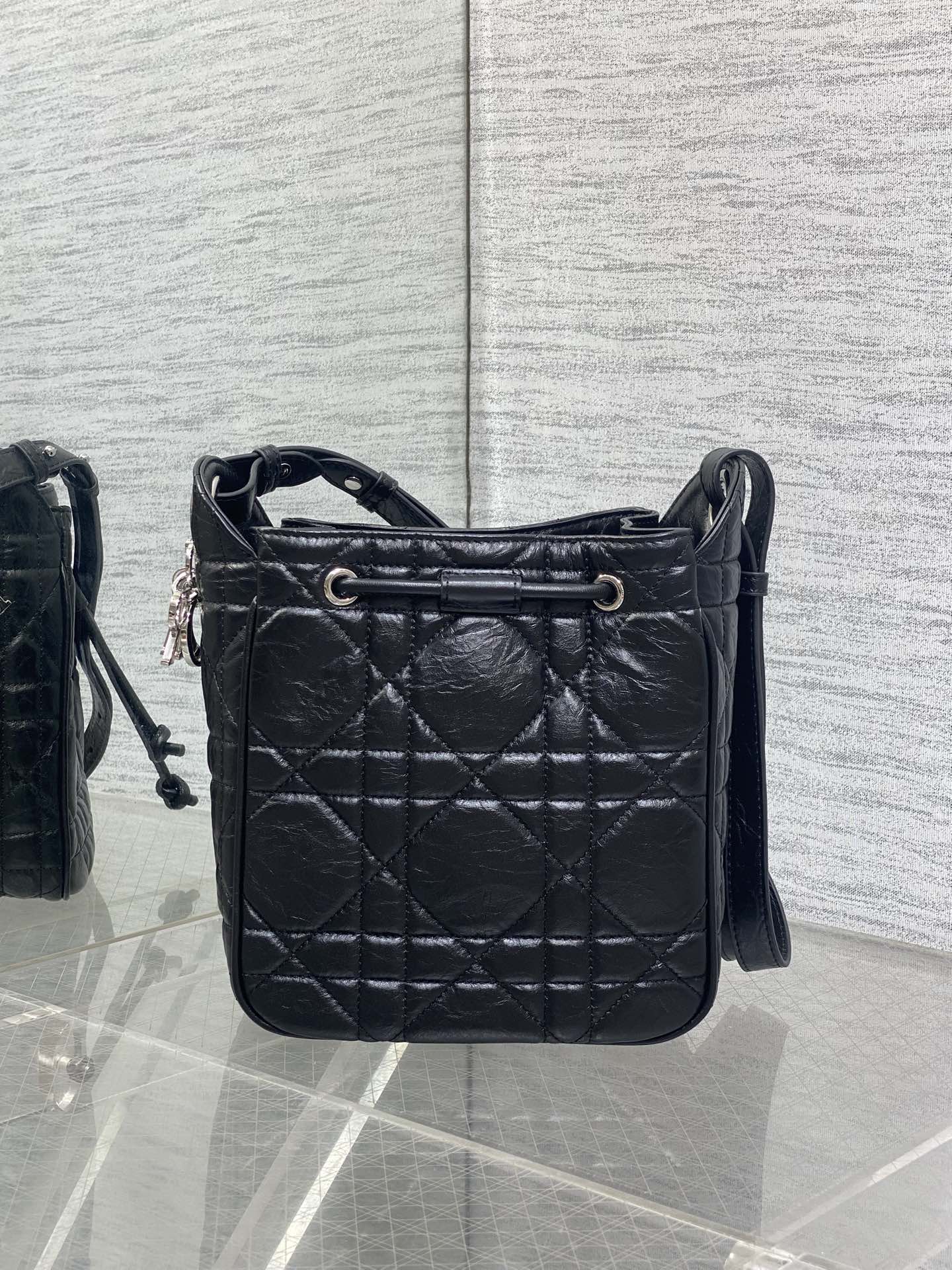 Dior Caro Motion Small Drawstring Bucket Bag Black Aged Leather Quilted Crossbody 1025