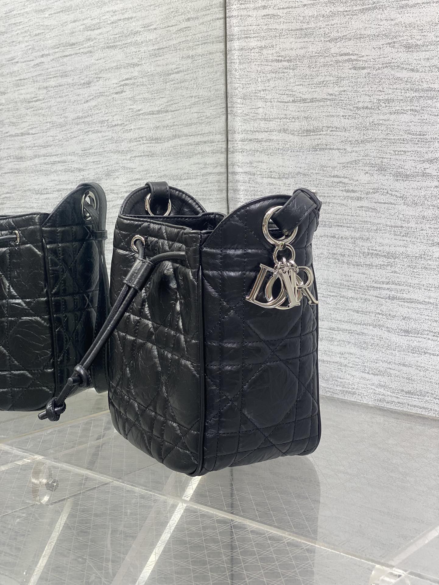 Dior Caro Motion Small Drawstring Bucket Bag Black Aged Leather Quilted Crossbody 1025