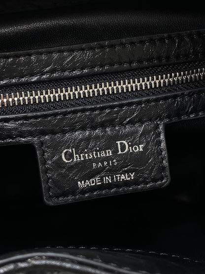 Dior Caro Motion Small Drawstring Bucket Bag Black Aged Leather Quilted Crossbody 1025