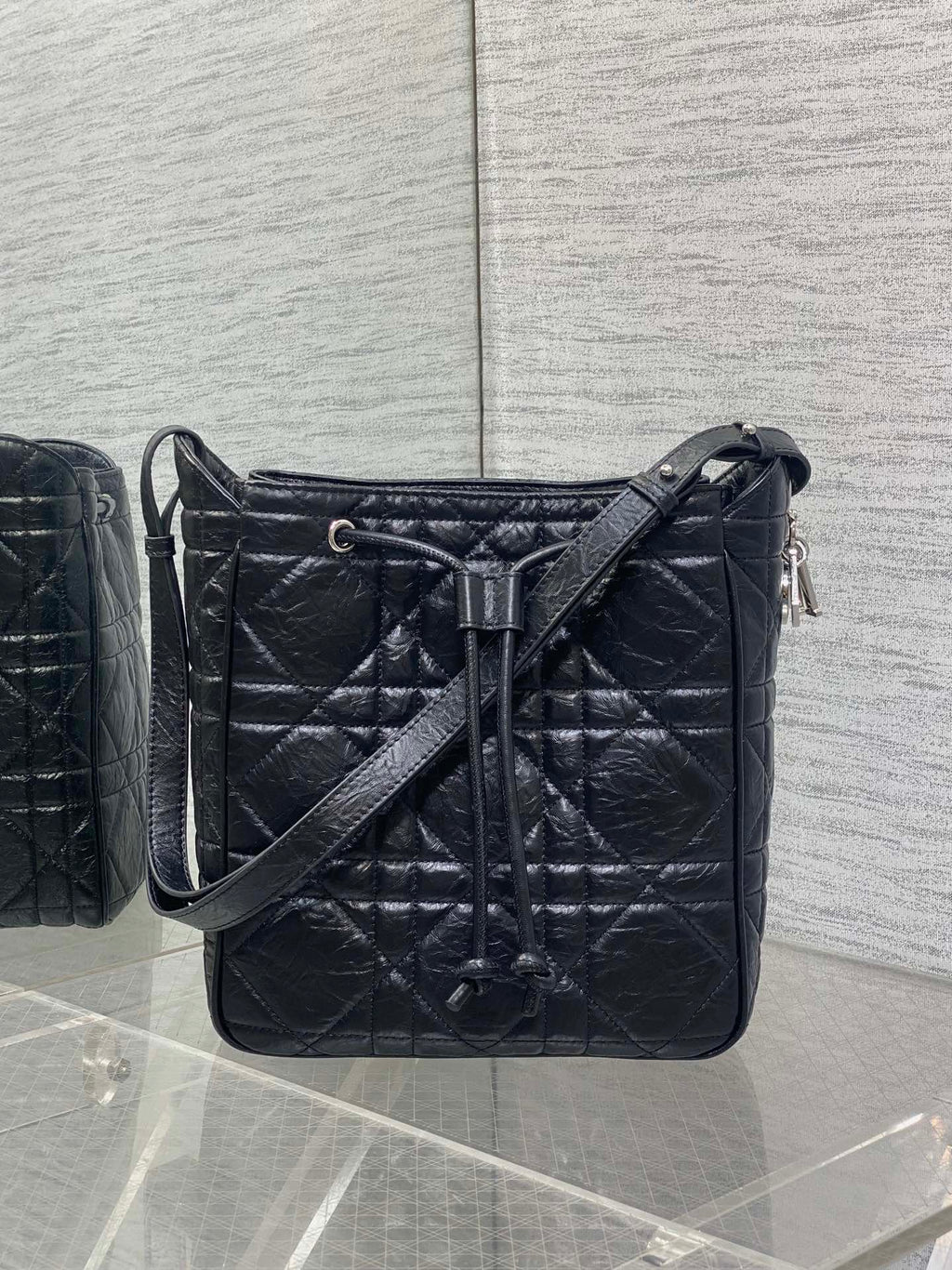Dior Caro Motion Medium Drawstring Bucket Bag Black Aged Leather Quilted Crossbody 1026