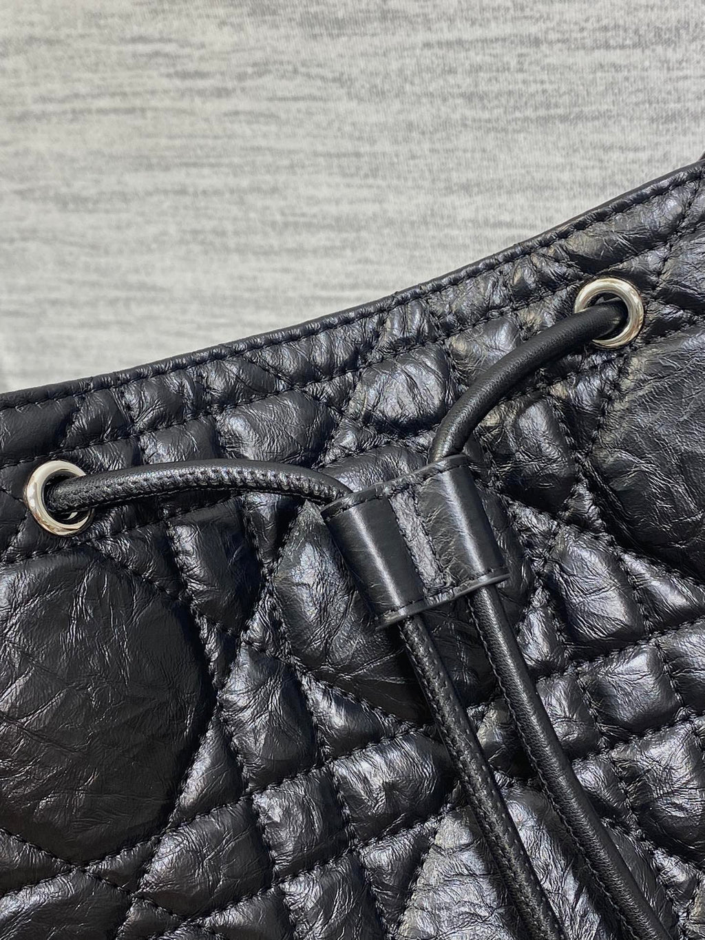 Dior Caro Motion Medium Drawstring Bucket Bag Black Aged Leather Quilted Crossbody 1026