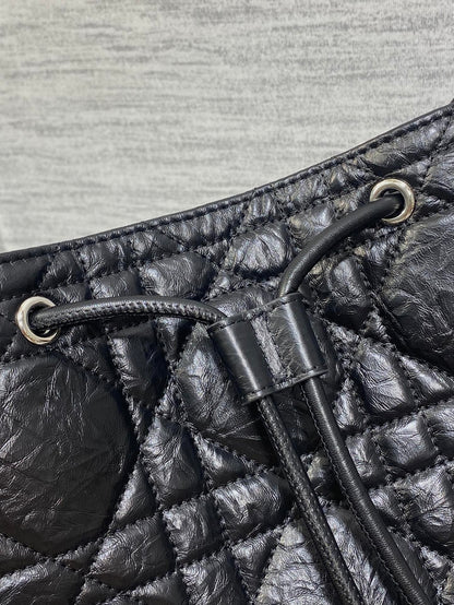 Dior Caro Motion Medium Drawstring Bucket Bag Black Aged Leather Quilted Crossbody 1026