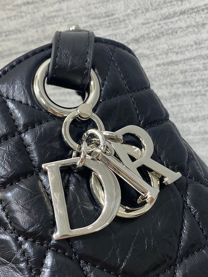 Dior Caro Motion Medium Drawstring Bucket Bag Black Aged Leather Quilted Crossbody 1026