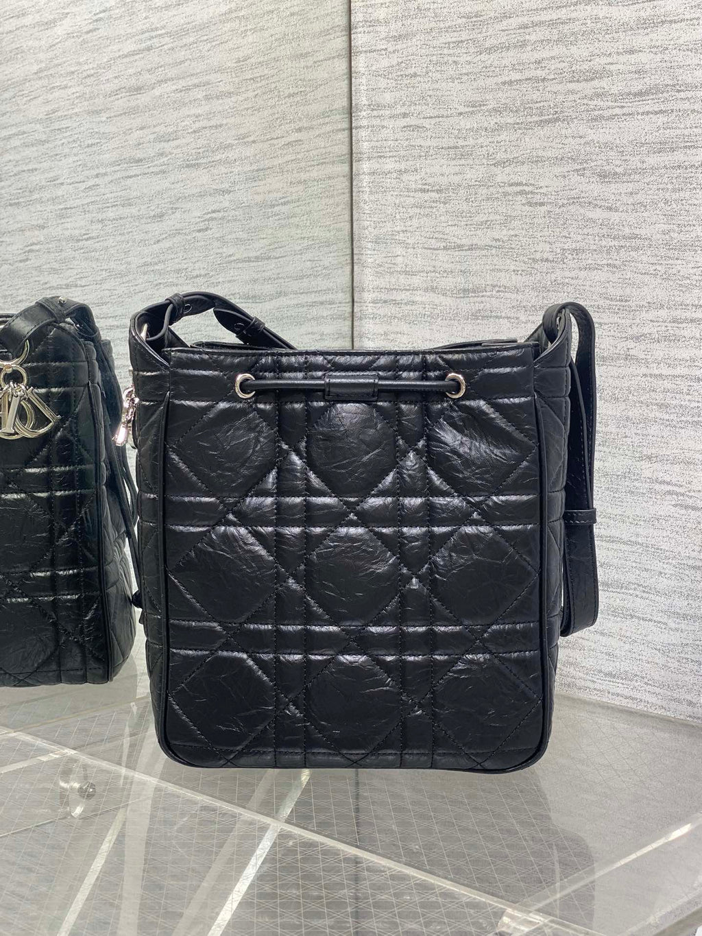 Dior Caro Motion Medium Drawstring Bucket Bag Black Aged Leather Quilted Crossbody 1026