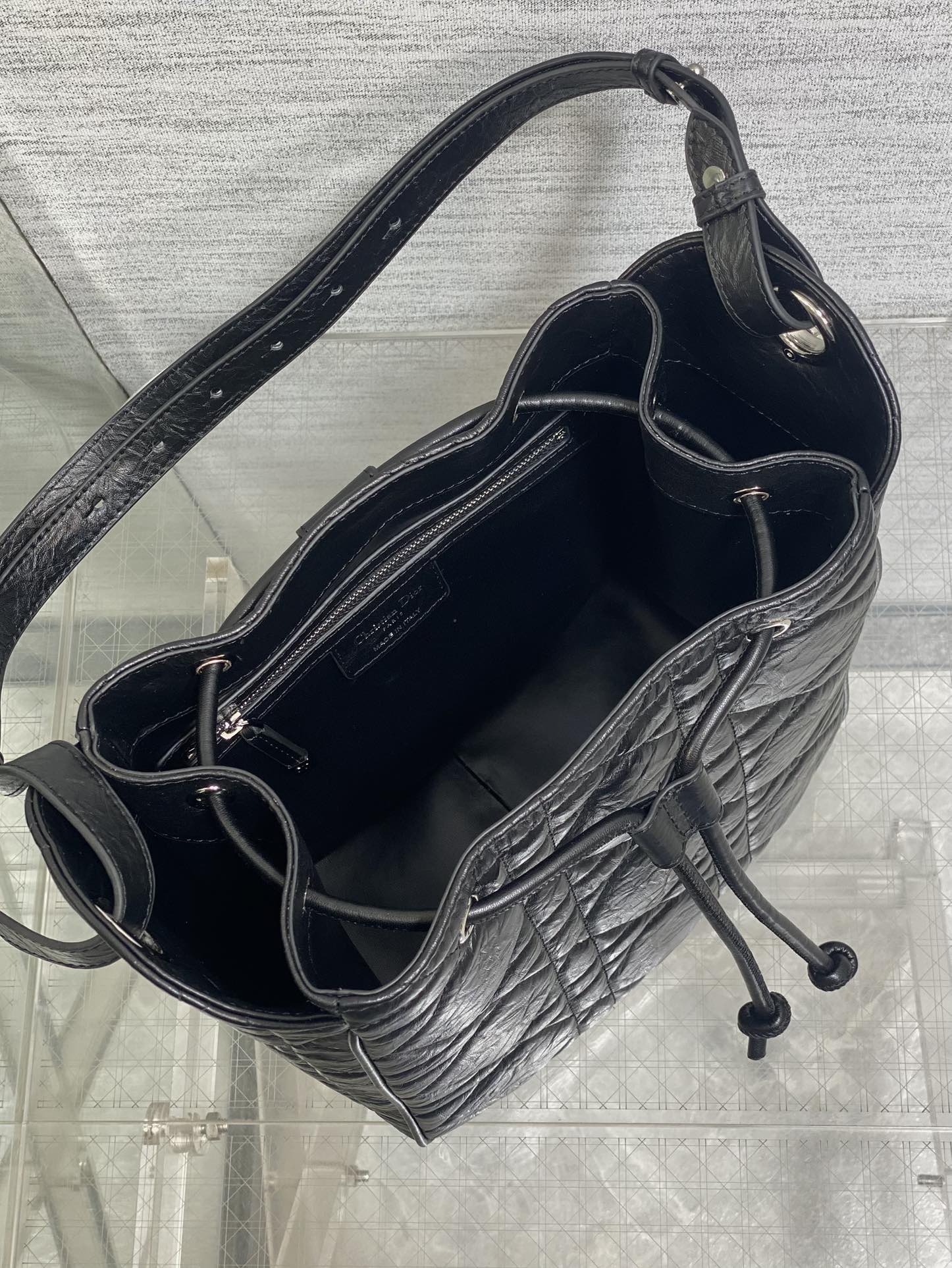 Dior Caro Motion Medium Drawstring Bucket Bag Black Aged Leather Quilted Crossbody 1026