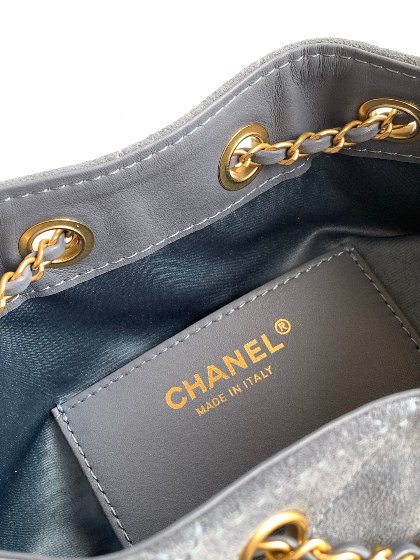 Chanel Mini Drawstring Bucket Bag with Gold CC Medallion (26C) — Denim Blue Suede
